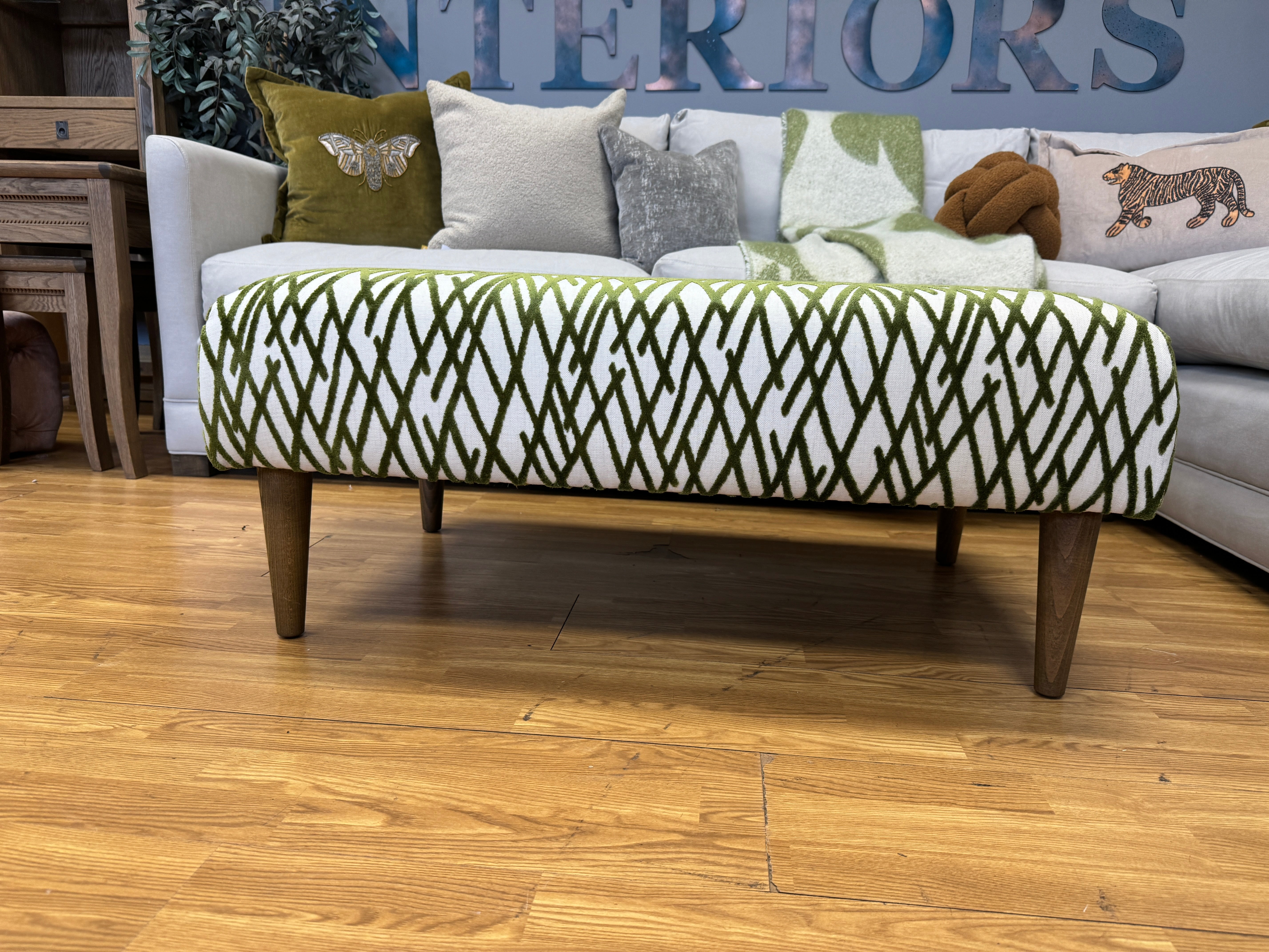 WHITE LABEL Development low bench footstool in cream and green fabric